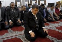 Mohammad Morsi (August 8, 1951- June 17, 2019) the fifth elected President of Egypt (June 30, 2012 – July 3, 2013) leading prayer (Photo: AFP: 2012)